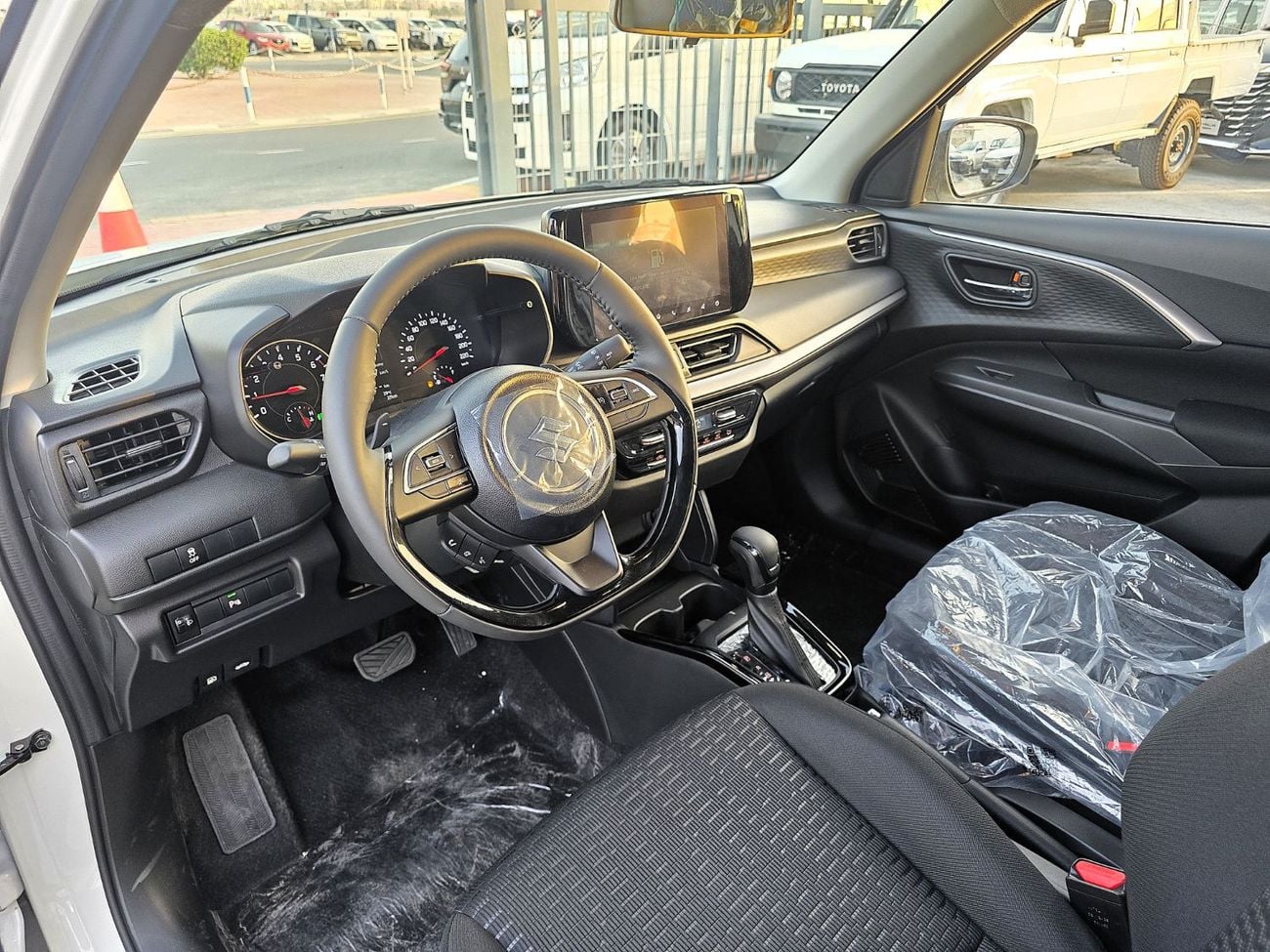 Suzuki Swift Suzuki Swift GLX 1.2L Two Tone White color with black roof  2026 model