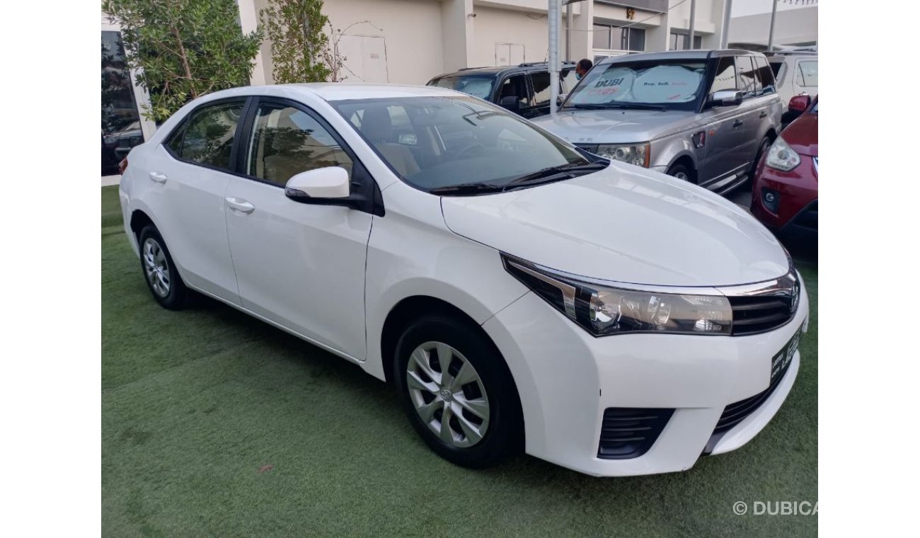 Toyota Corolla 1600 CC model 2016 GCC white color inside beige control unit in excellent condition