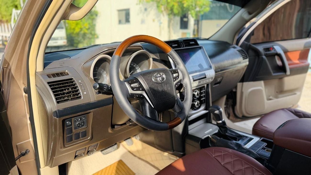 تويوتا برادو MODIFIED TO 2023 MODEL | PARKING SENSORS | BACK CAMERA | 2.7L PETROL | AUTO | LHD | REAR HEADREST LC