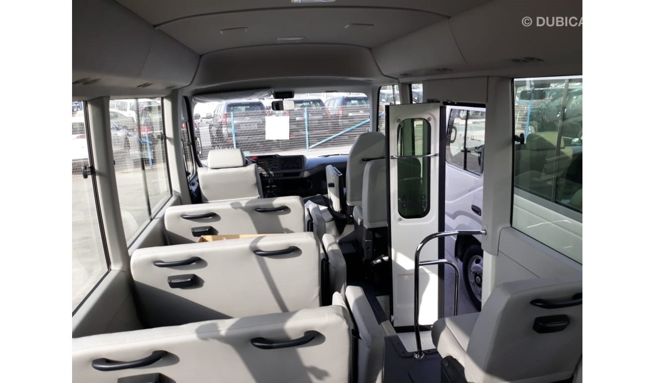 Toyota Coaster DIESEL 4.2L WITH AIR BAGS ABS AND POWER DOOR