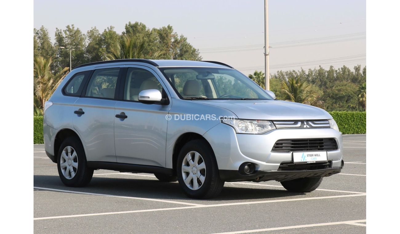 ميتسوبيشي آوتلاندر 2014 | MITSUBISHI OUTLANDER - 7 SEATER CAPACITY PETROL A/T WITH GCC SPECS AND EXCELLENT CONDITION