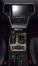 Jeep Grand Cherokee EXCELLENT DEAL for our Jeep Grand Cherokee Limited 4x4 ( 2016 Model ) in Red Color GCC Specs