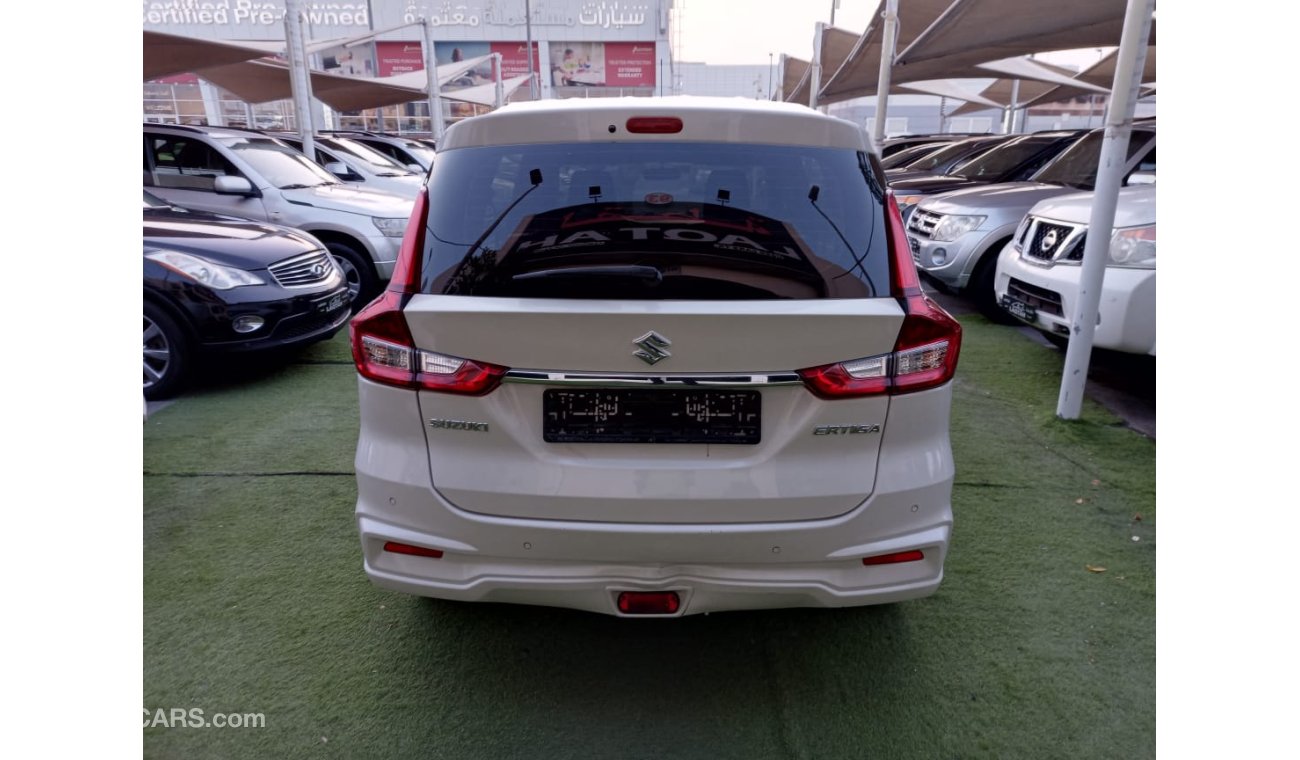 Suzuki Ertiga Gulf model 2019 paint agency 1600 cc white color imprint rear wing in excellent condition