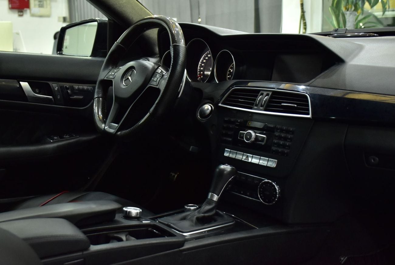 Mercedes-Benz C 63 AMG EXCELLENT DEAL for our Mercedes Benz C63 AMG ( 2013 Model ) in Black Color GCC Specs