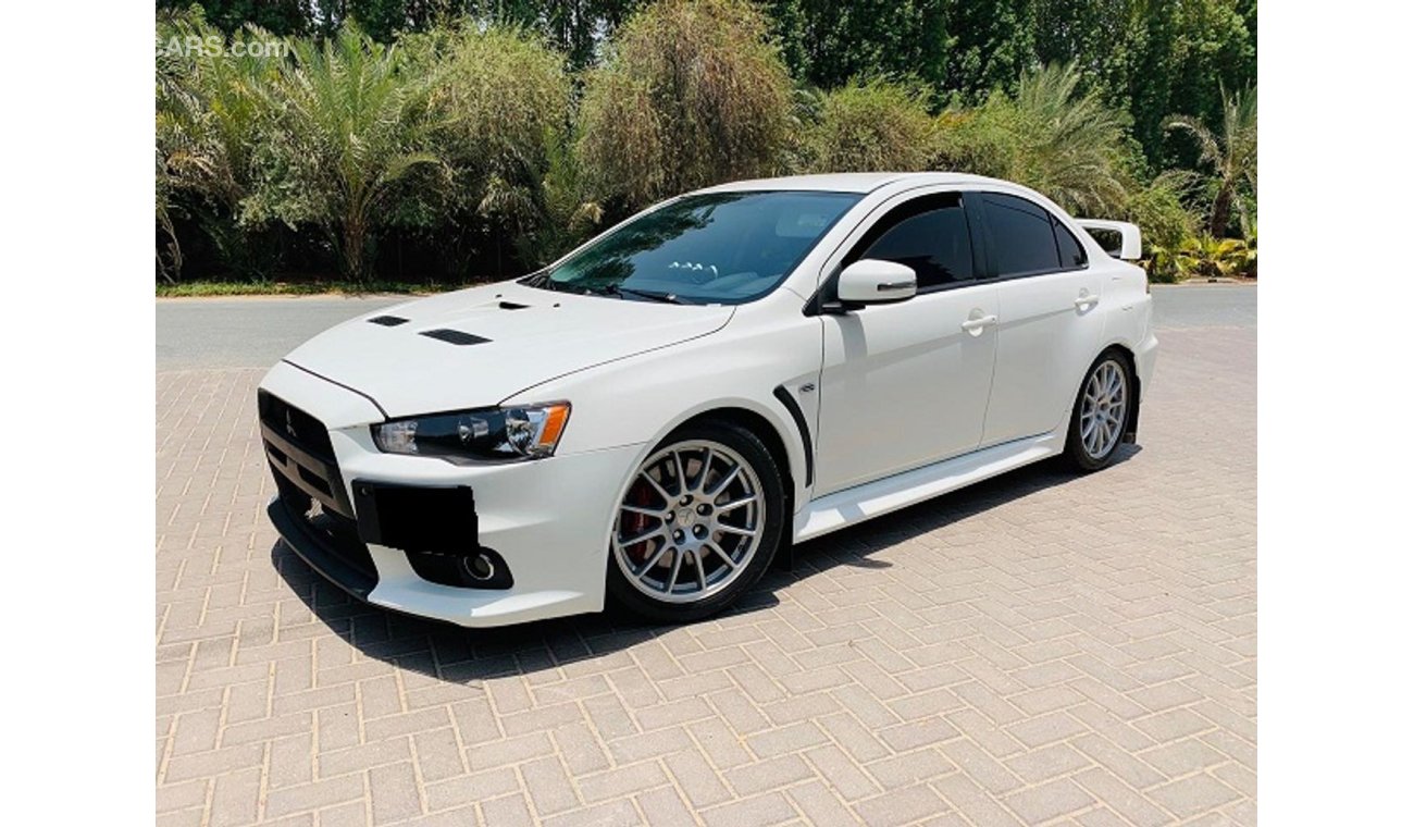 Mitsubishi Evo 2015 Mitsubishi Lancer Evolution X White | A 1001