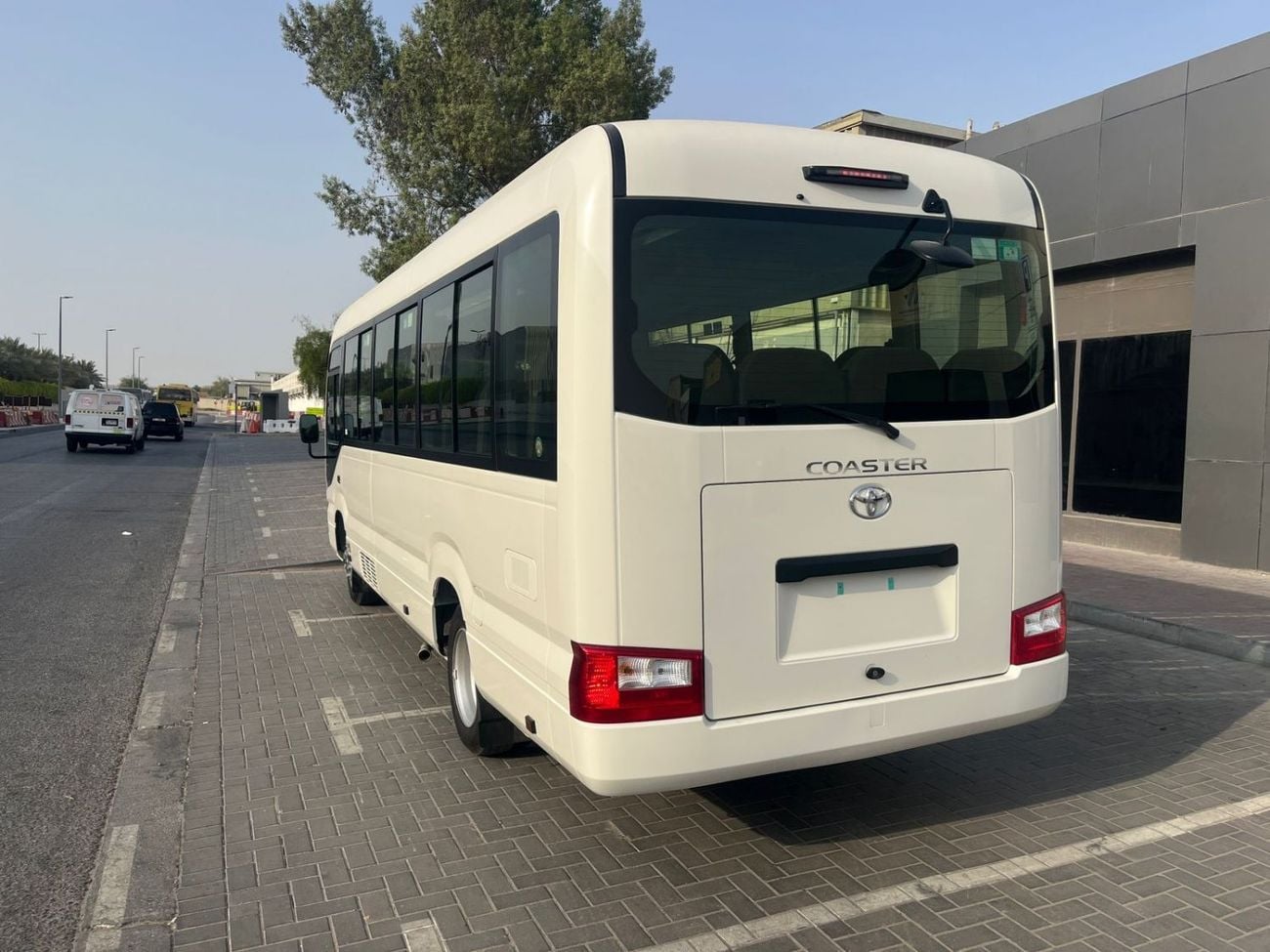 Toyota Coaster 4.0L ECTTAE004 - 2026 Toyota Coaster - 4.0L Diesel Manual – 23 Seats, Auto Door, 3PSB, Mic, Baggage Rack
