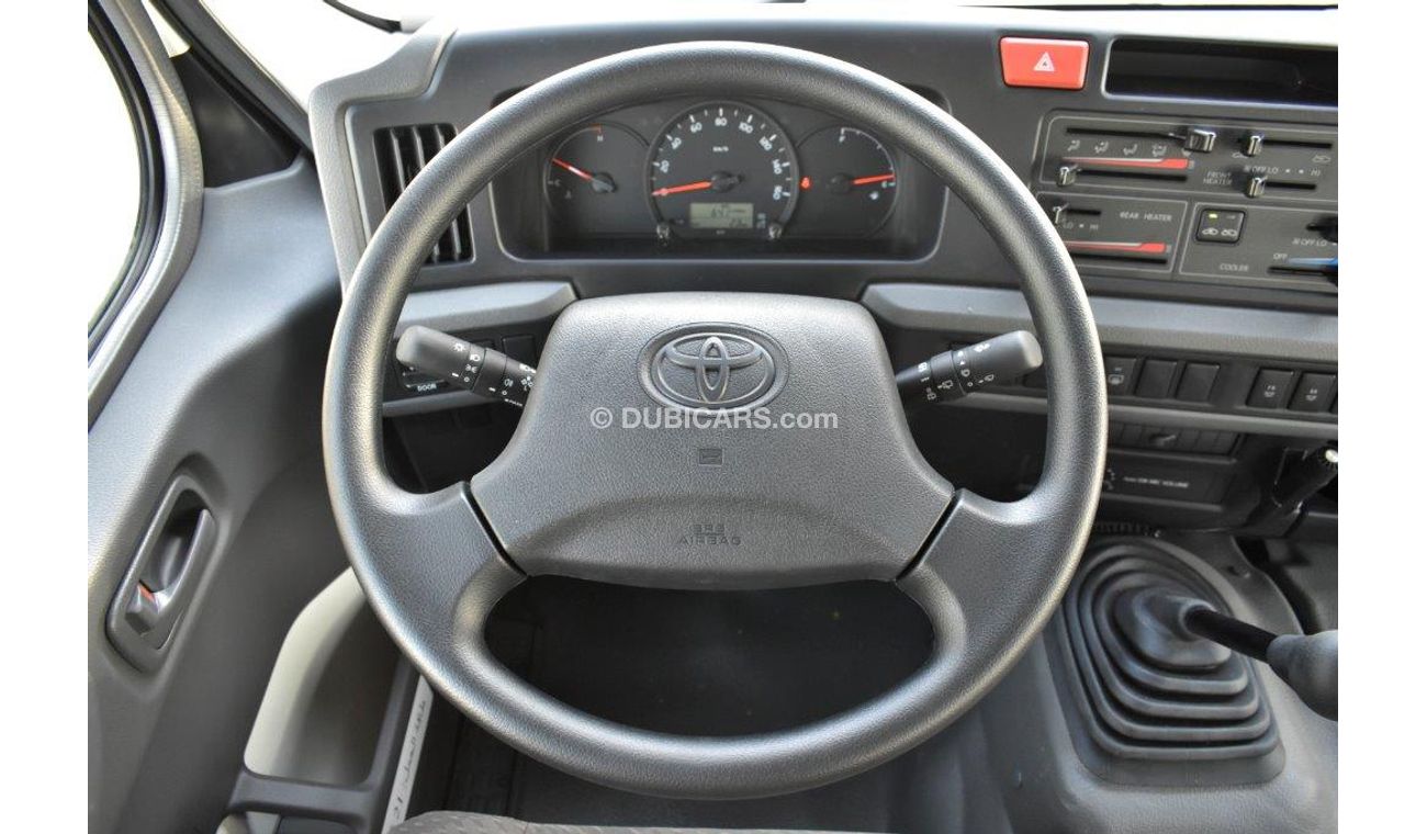 Toyota Coaster High roof Bus 2.7L MT - Special 22 Seater