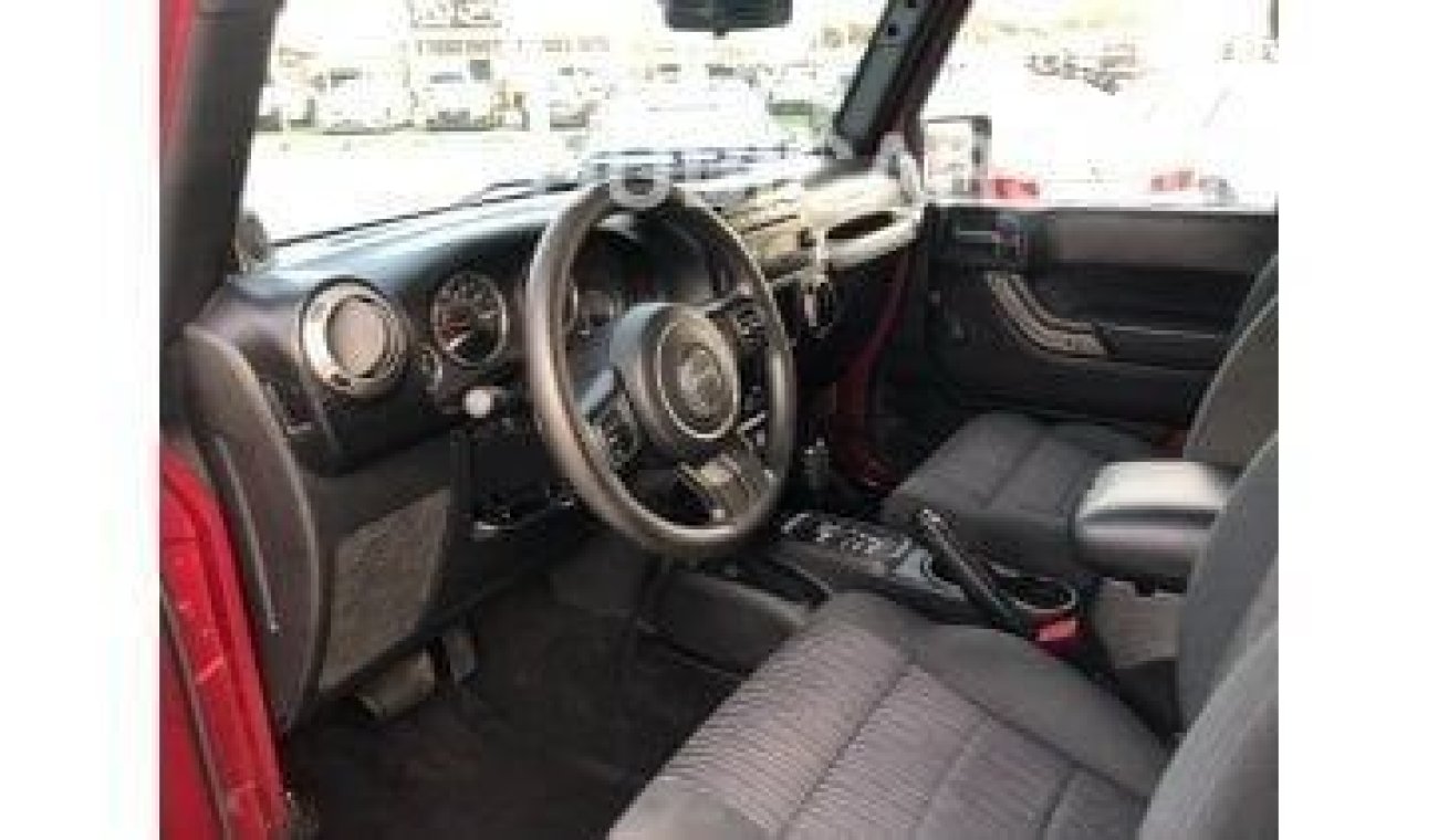 Jeep Wrangler Wrangler Sport 2012 model in excellent condition, inside and out