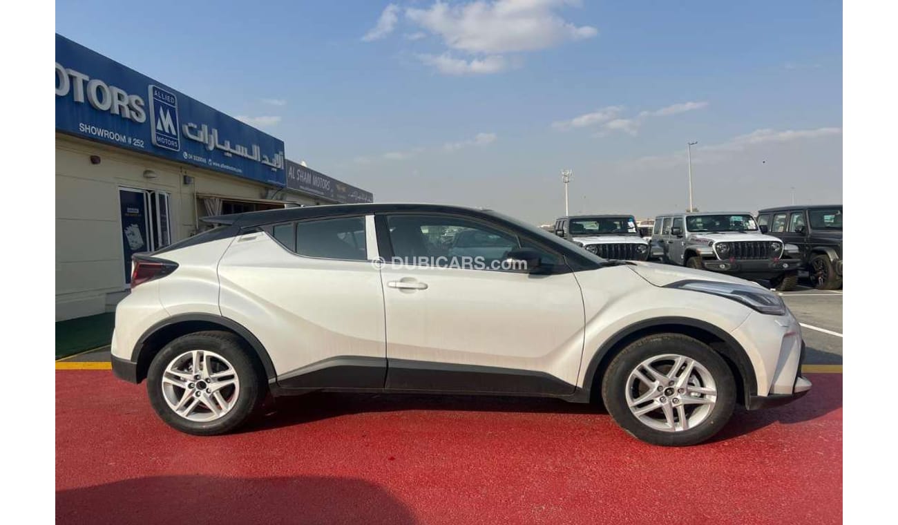 Toyota CHR 2.0L Pet - A/T - FABRIC - 22YM - 4AB+CRUISE - WHT_BLK (UAE OFFER)