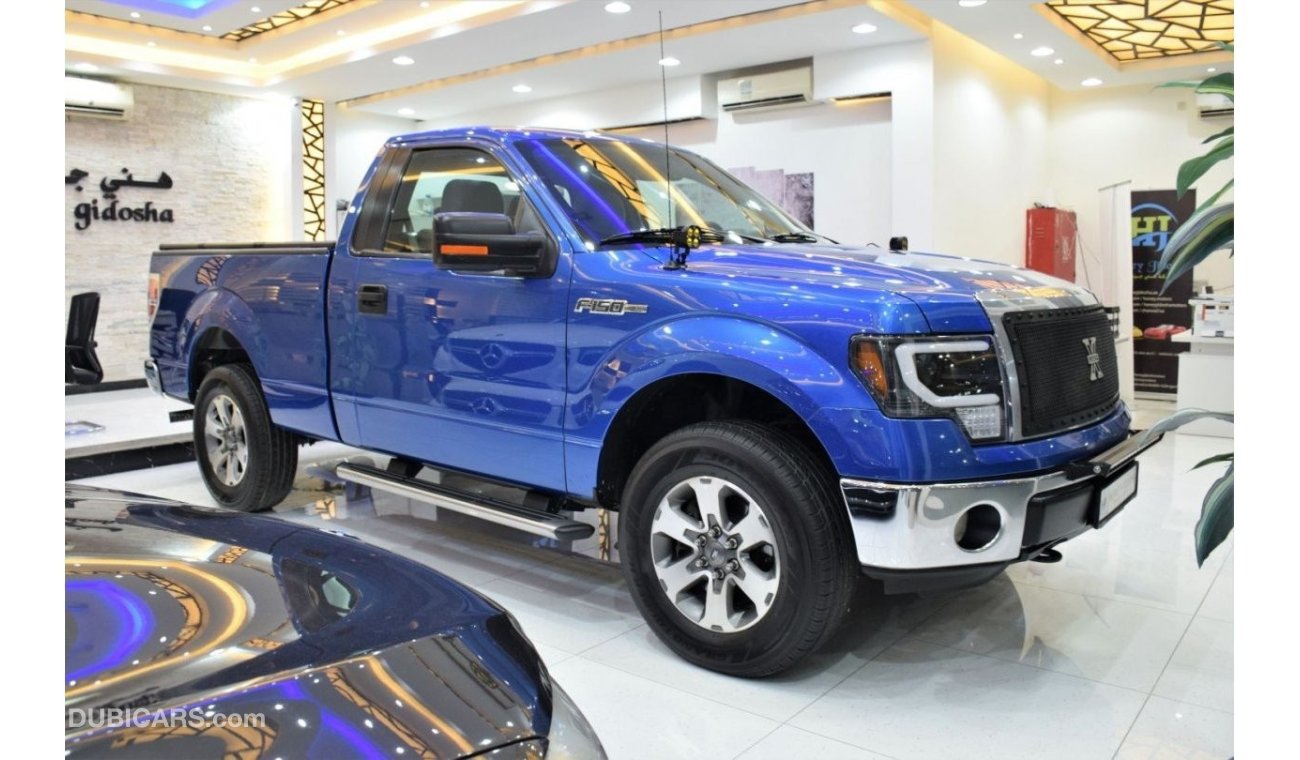 Ford F-150 XLT EXCELLENT DEAL for our Ford F-150 XLT 4x4 ( 2012 Model ) in Blue Color! GCC Specs