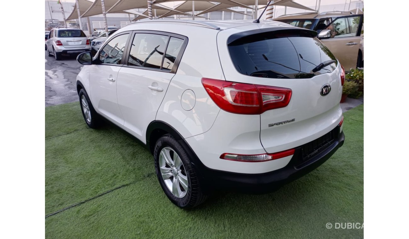 Kia Sportage Gulf, dye, agency number 2, cruise control, wheels, rear wing sensors, in excellent condition, you d