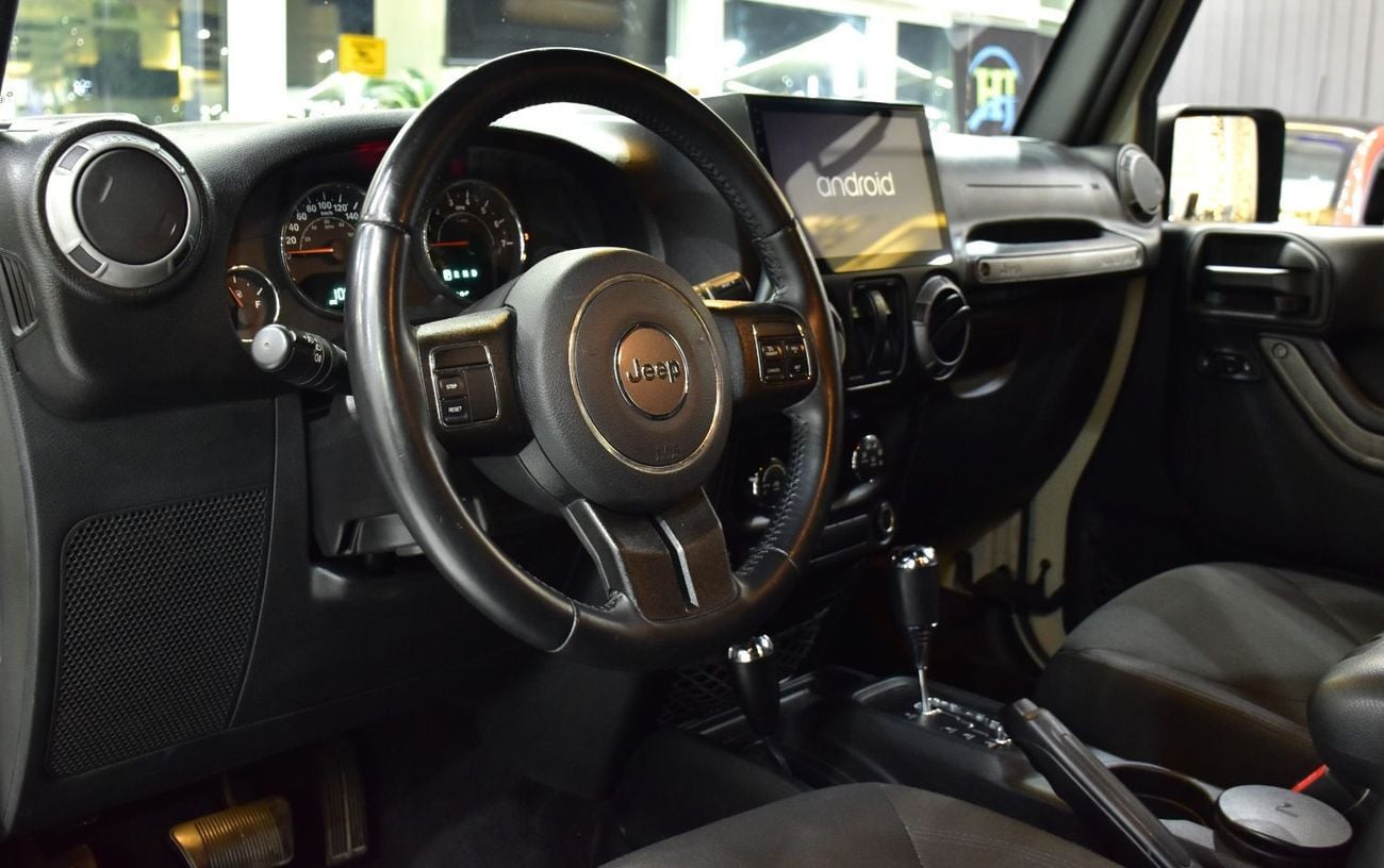 Jeep Wrangler SPORT EXCELLENT DEAL for our Jeep Wrangler Sport ( 2017 Model ) in Beige Color GCC Specs