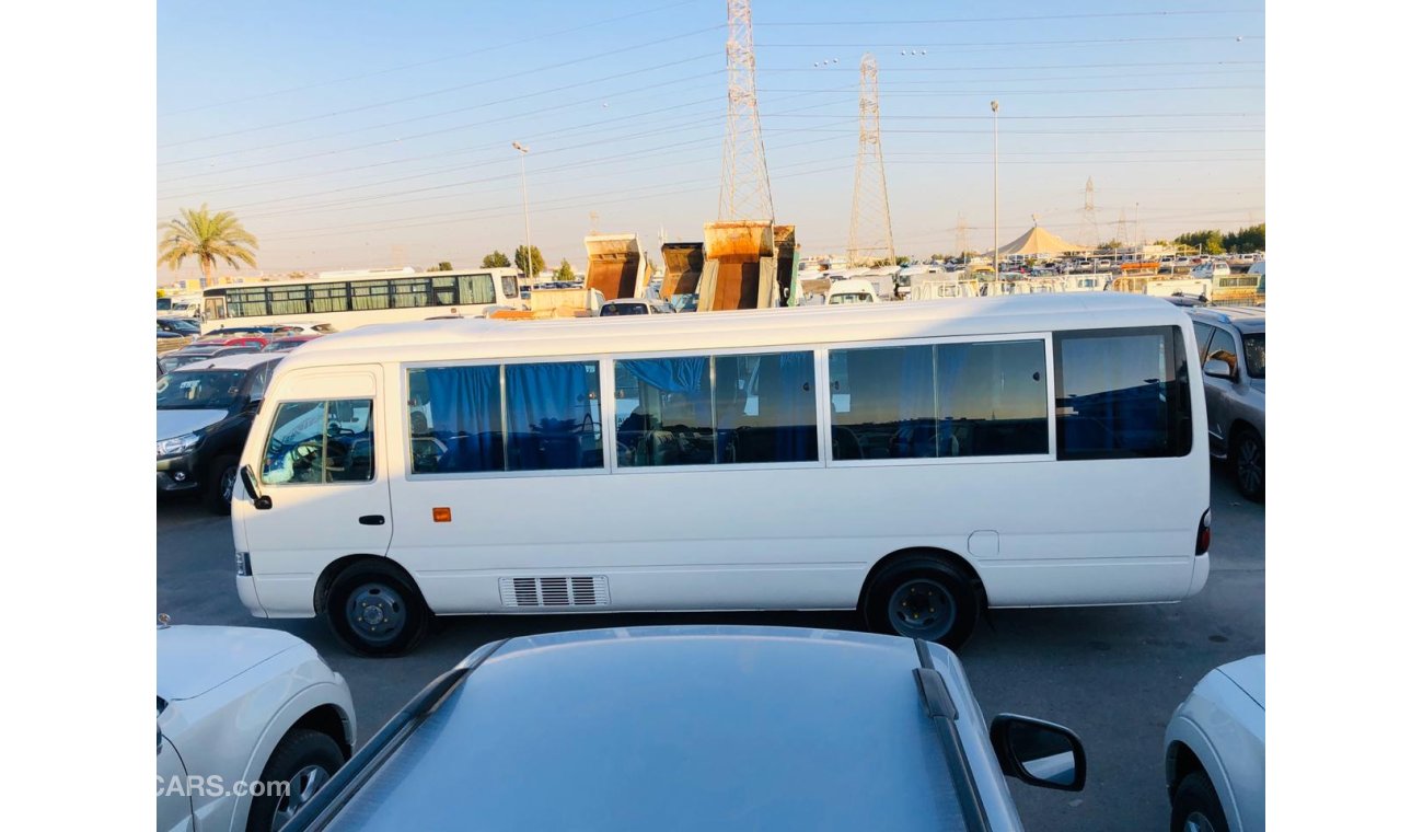 تويوتا كوستر 30 SEATER, LIKE BRAND NEW, DVD, REAR CAMERA