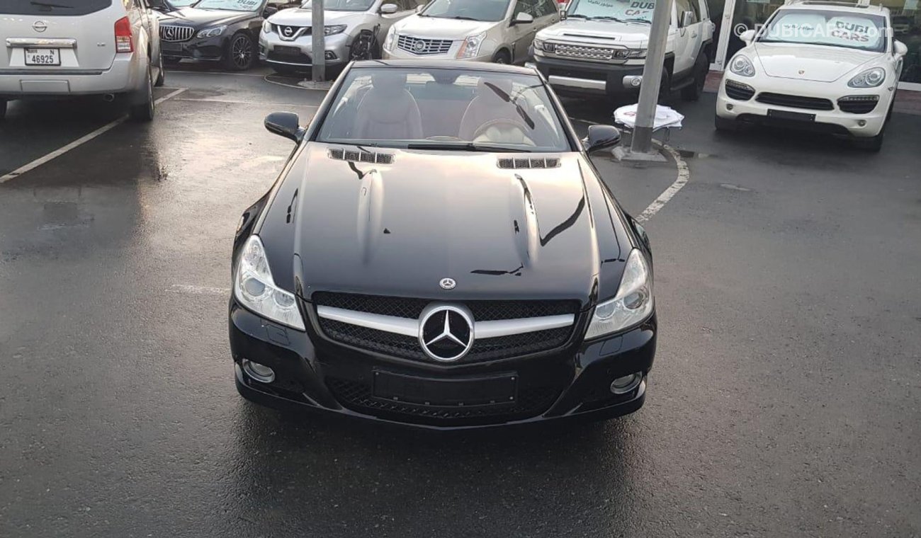 مرسيدس بنز SL 350 موديل 2009 خليجي حاله ممتازه من الداخل والخارج فل مواصفات كشف كراسي جلد ومثبت سرعه