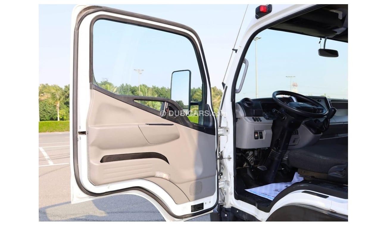 Mitsubishi Fuso Canter | Long Chassis | Shutter Box Water Body | Excellent Condition | GCC