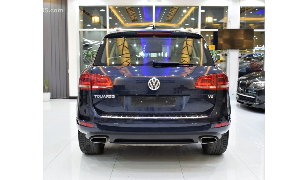 Volkswagen Touareg SEL EXCELLENT DEAL for our Volkswagen Touareg ( 2015 Model! ) in Blue Color! GCC Specs