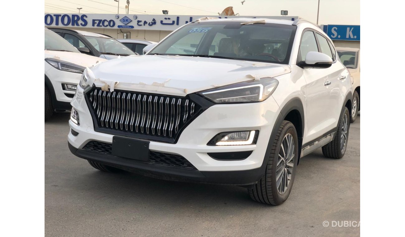 Hyundai Tucson 2.0L, WOOD INTERIOR, SPECIAL LED, DVD+ Rear Camera, 2-Pwr Seats, Alloy Rims 18'', خصيصا للسودان