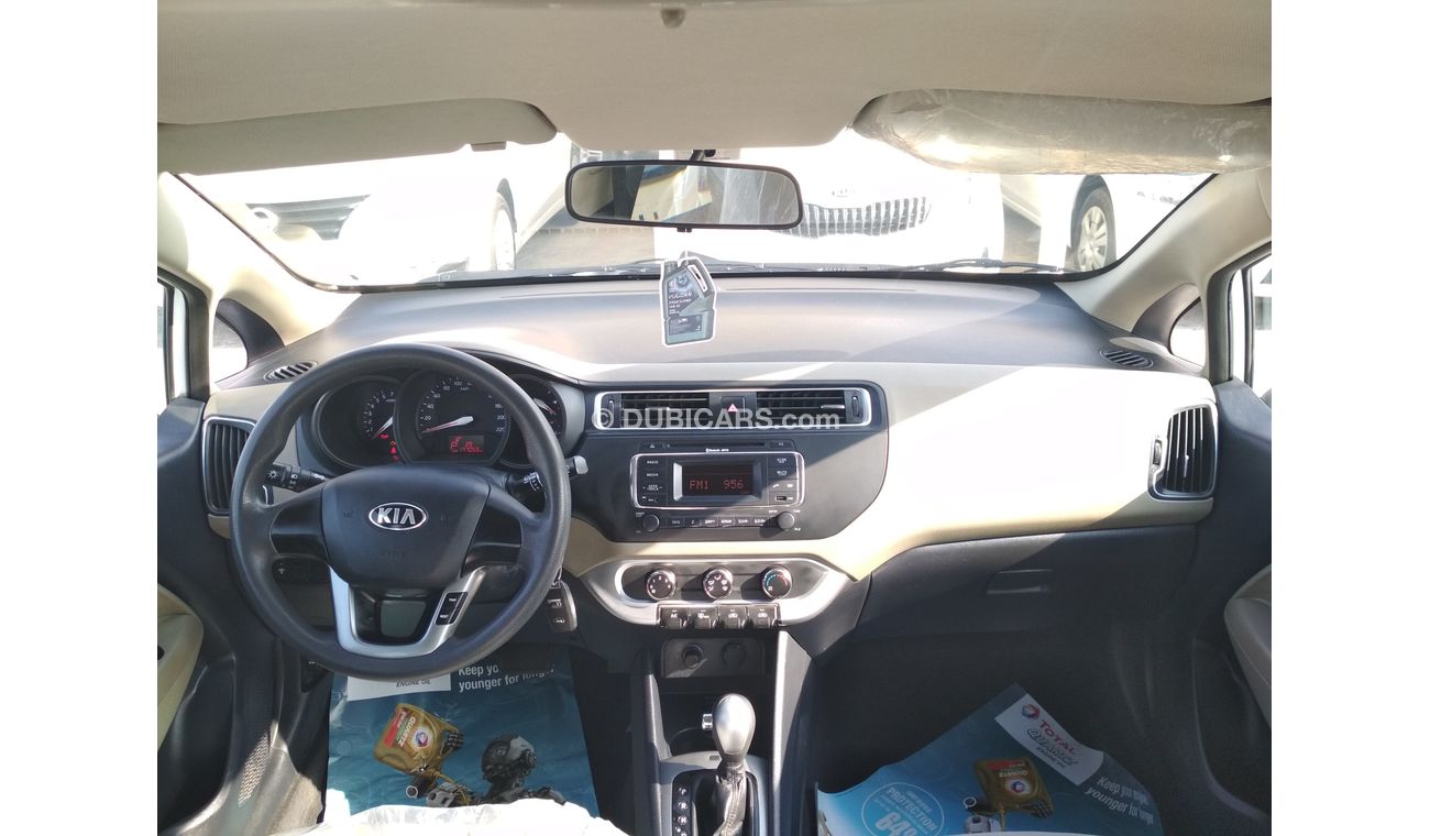 Kia Rio WHITE 2015 GCC NO PAINT NO ACCIDENT PERFECT