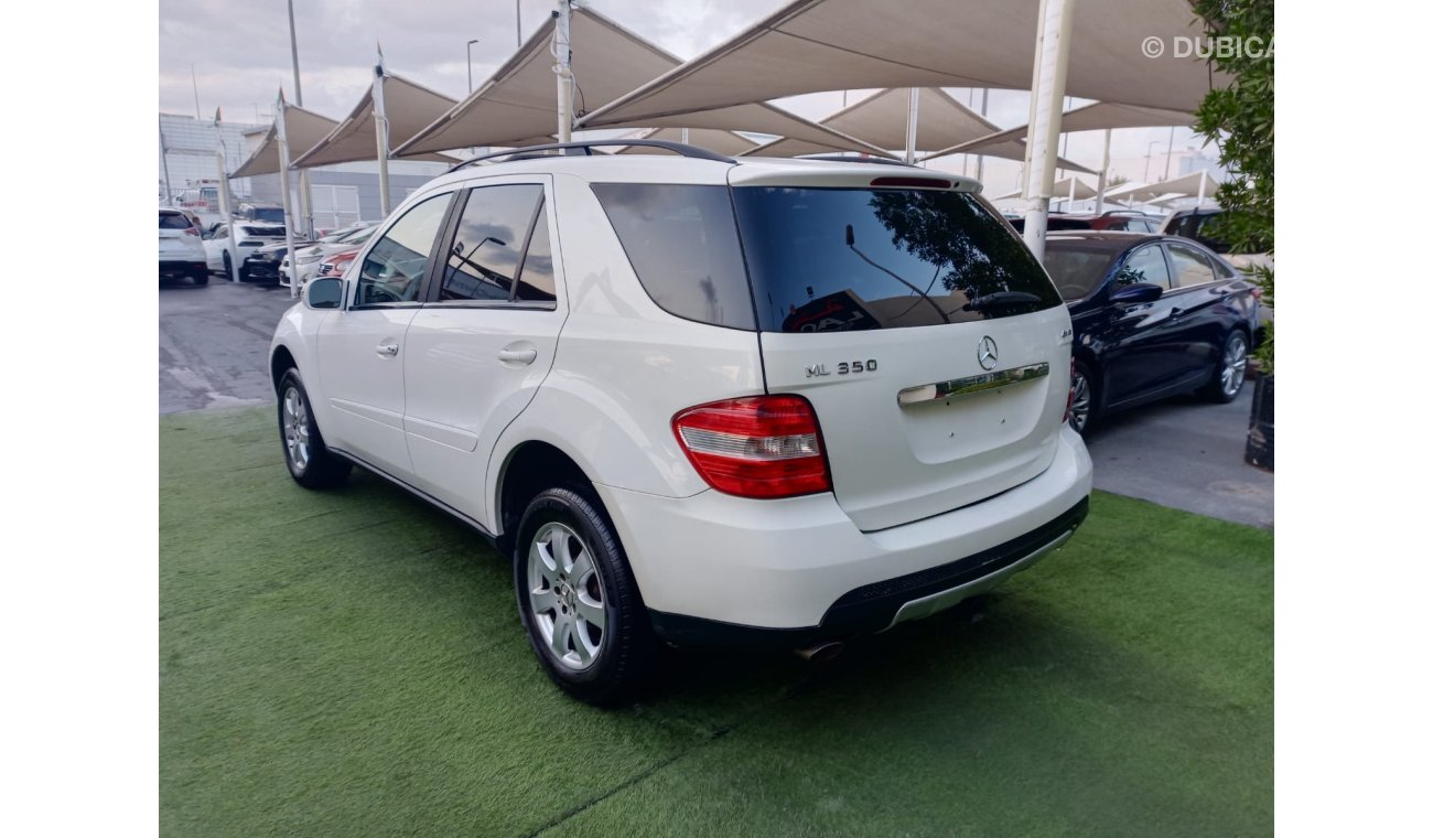 مرسيدس بنز ML 350 موديل 2007 وارد فتحة جلد مثبت سرعة تحكم رنجات حساسات خشب شاشة كاميرا خلفية بحالة ممتازة