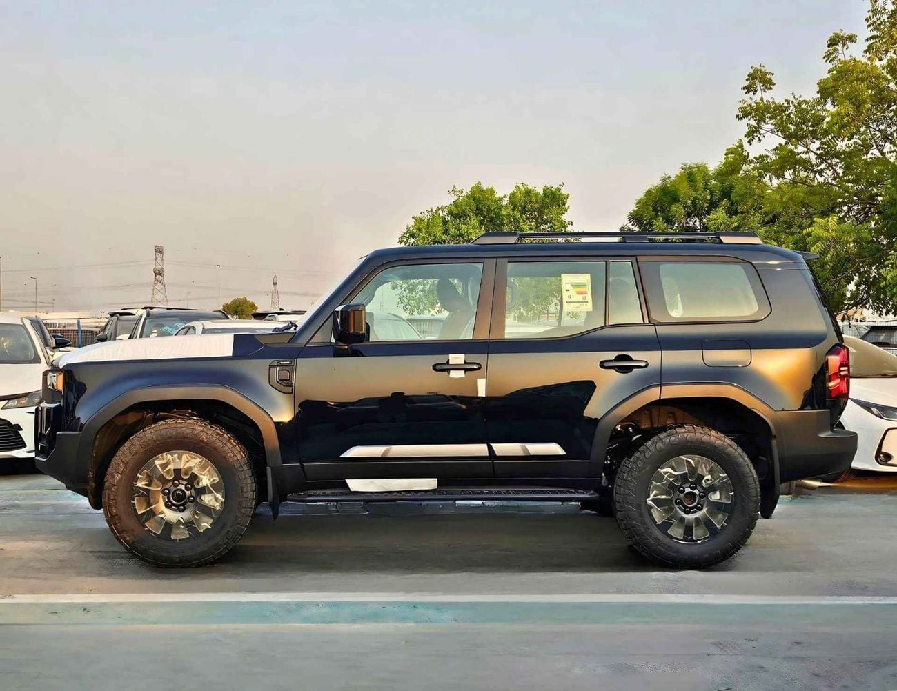 تويوتا برادو ADVENTURE TURBO / 2.4L V4 PETROL / MID OPTION / DRIVER POWER SEATS (CODE # PR24S2)