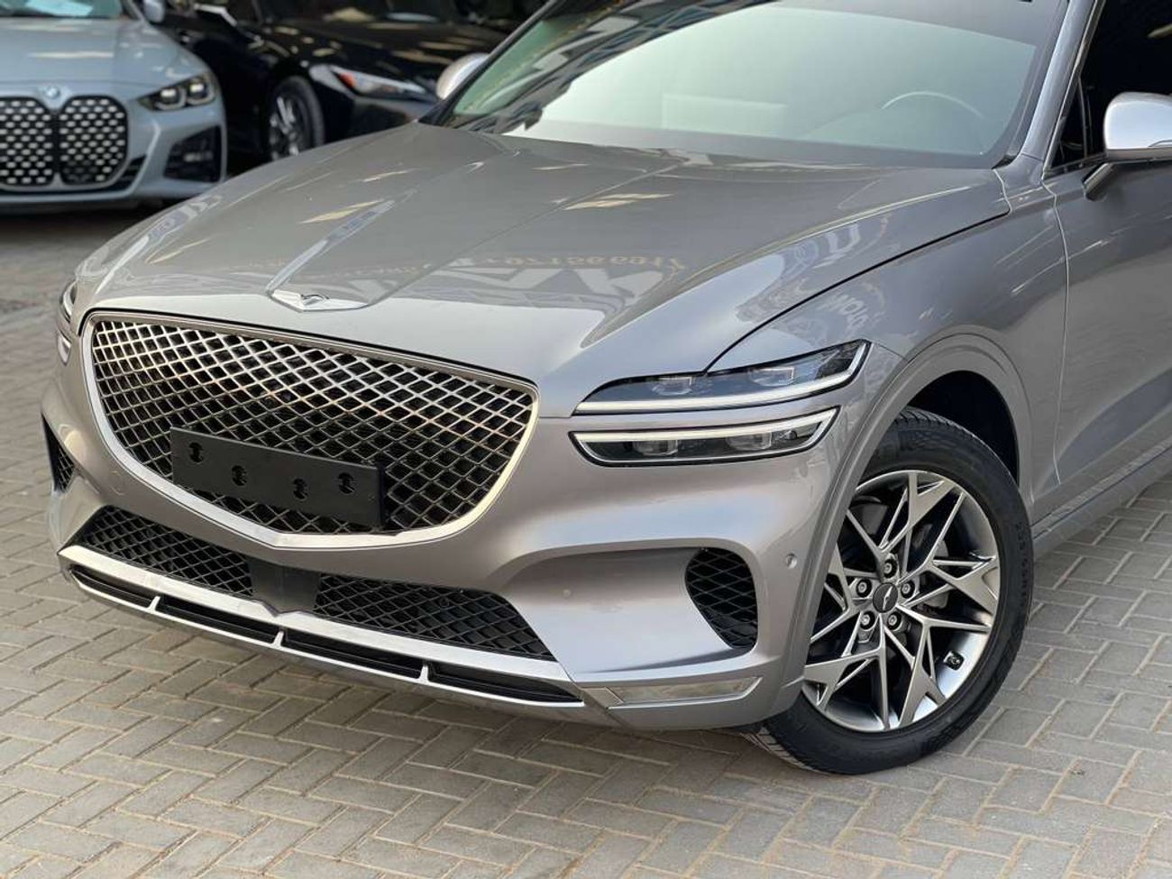 جينيسس GV70 / دفع رباعي / فتحة سقف بانورامية / كاميرا 360 درجة / مسافة منخفضة / بحالة ممتازة