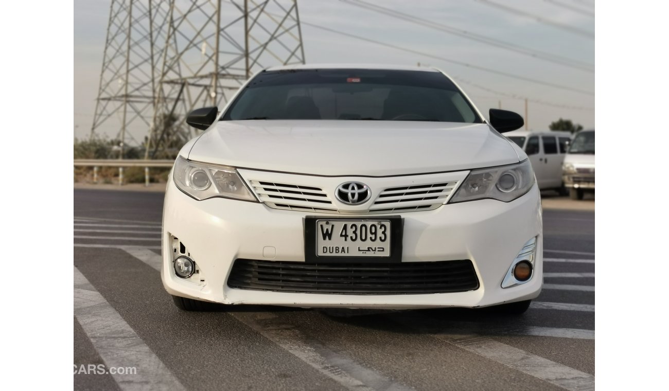 Toyota Camry 2.5L, Leather Seats, DVD + Rear DVD, Alloy Rims 16'', Rear AC, Wooden Interior (LOT # TCW2014)