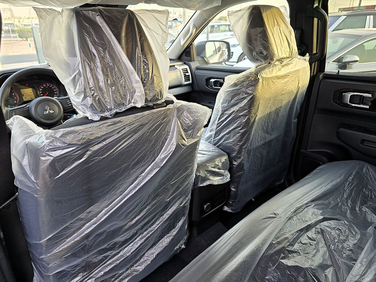 Mitsubishi L200 GL 2.4L (128 HP) Double Cab Utility L200 Pickup 4WD GL Petrol DC 5M/T - 2.4L 2025 Model Brown Color