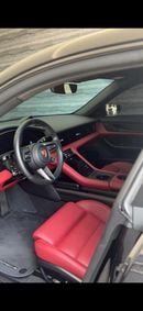 بورش تايكان Base