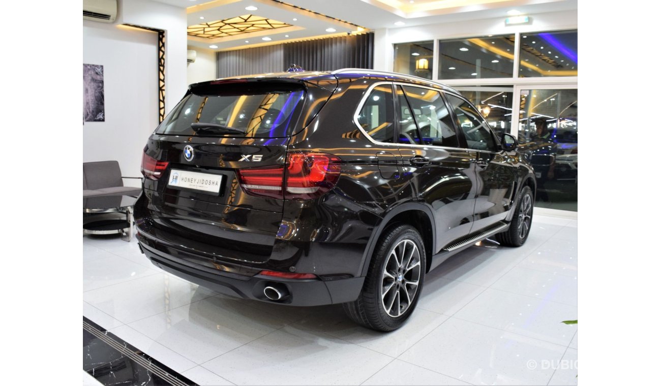 BMW X5 35i Exclusive EXCELLENT DEAL for our BMW X5 xDrive35i ( 2014 Model! ) in Brown Color! GCC Specs