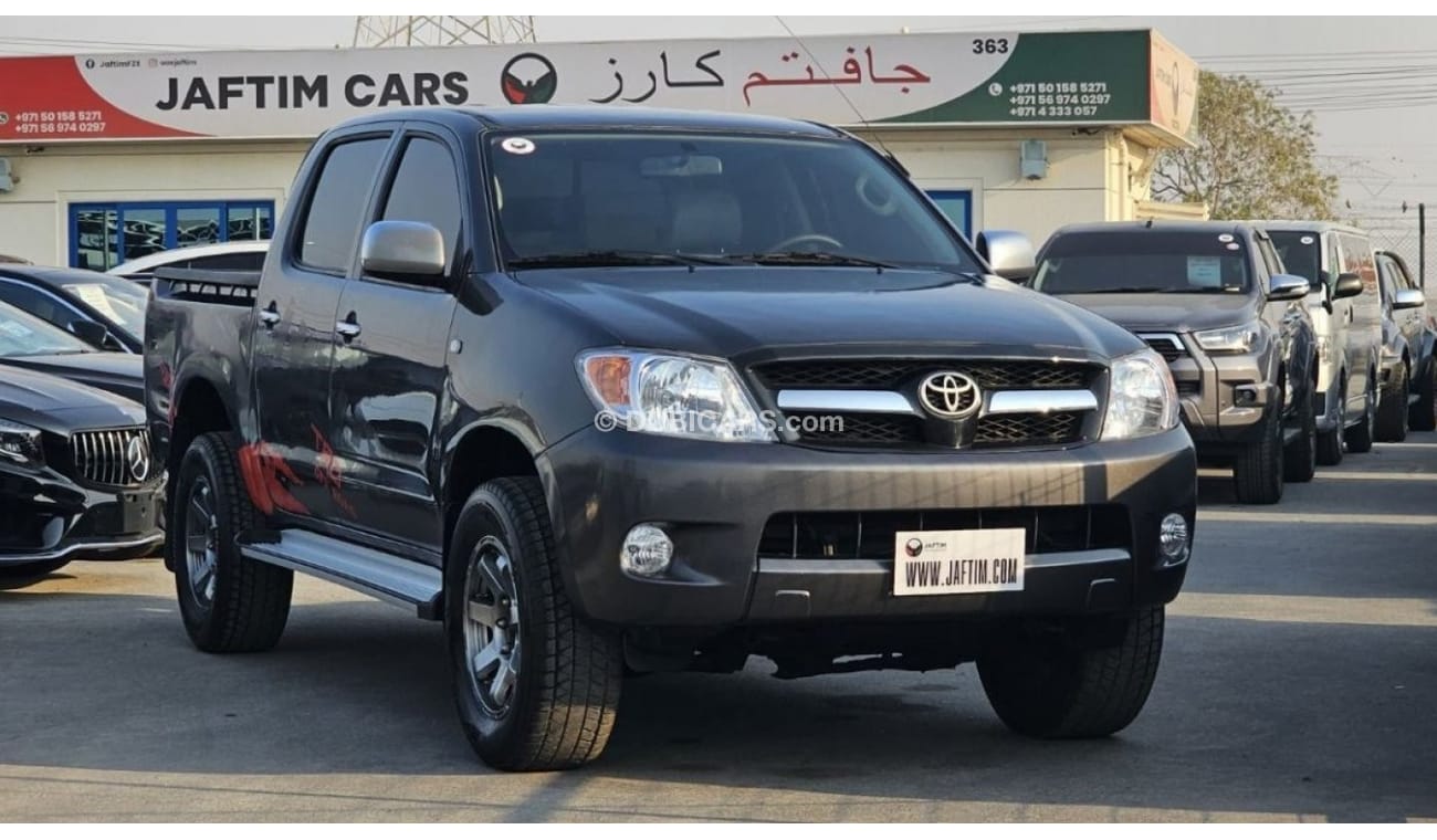 Toyota Hilux DIESEL 2KD | 2.5L ENGINE | LEFT-HAND-DRIVE | SIDE BODY STICKER | ALLOY RIMS | TINTED WINDOWS