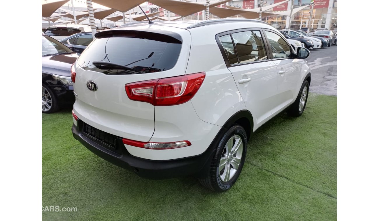 Kia Sportage Gulf, dye, agency number 2, cruise control, wheels, rear wing sensors, in excellent condition, you d