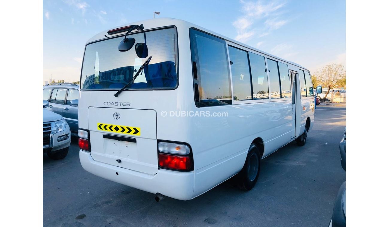 Toyota Coaster 30 SEATER------4.2L-DIESEL------LIKE BRAND NEW-DVD-REAR CAMERA-----ESPECIALMENTE PARA ANGOLA
