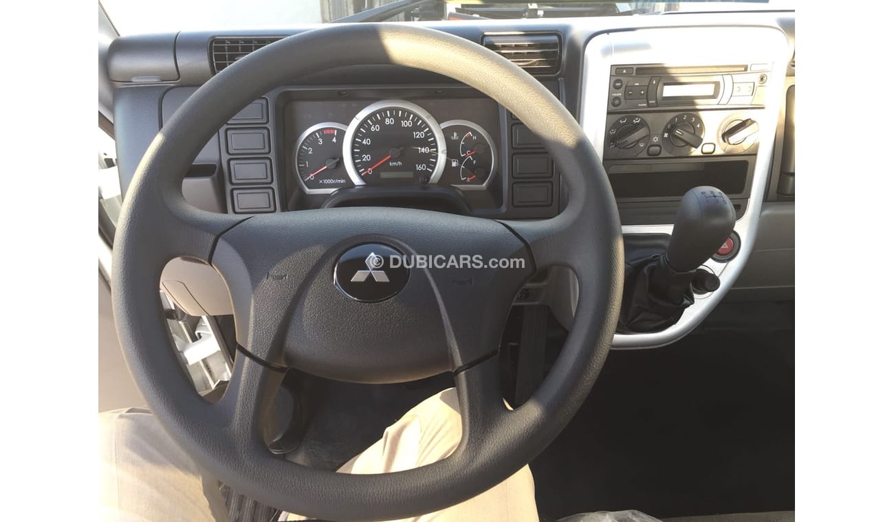 Mitsubishi Fuso Canter 4 ton  with  cargo body