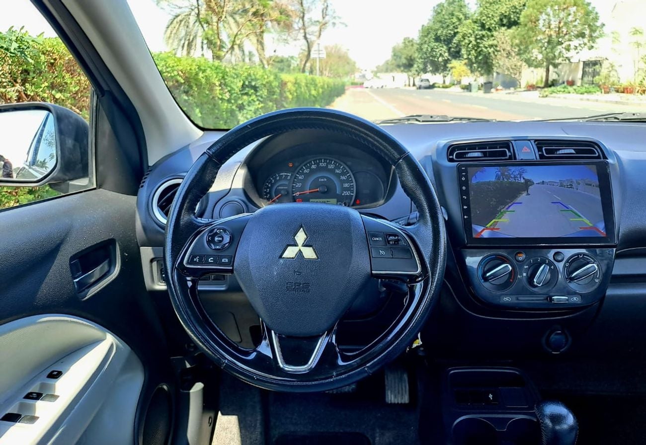 ميتسوبيشي اتراج GLX MID 370/- Monthly I GCC I Cruise, Camera, GPS I Accident Free