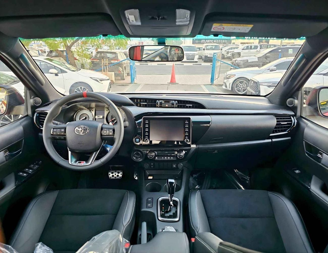 تويوتا هيلوكس GR SPORT DUAL TONE /4.0L V6 PETROL / BLIND SPOT / 360*CAMERA / DRIVER PWR SEATS (CODE#H4GRY)