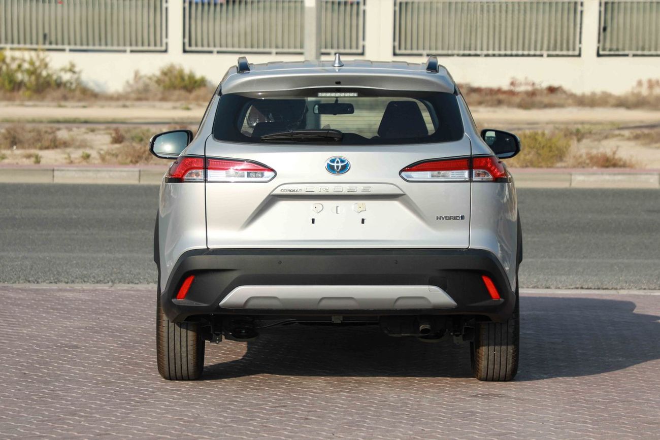 تويوتا كورولا كروس 1.8 Hybrid MID - Silver inside Red | Export Only