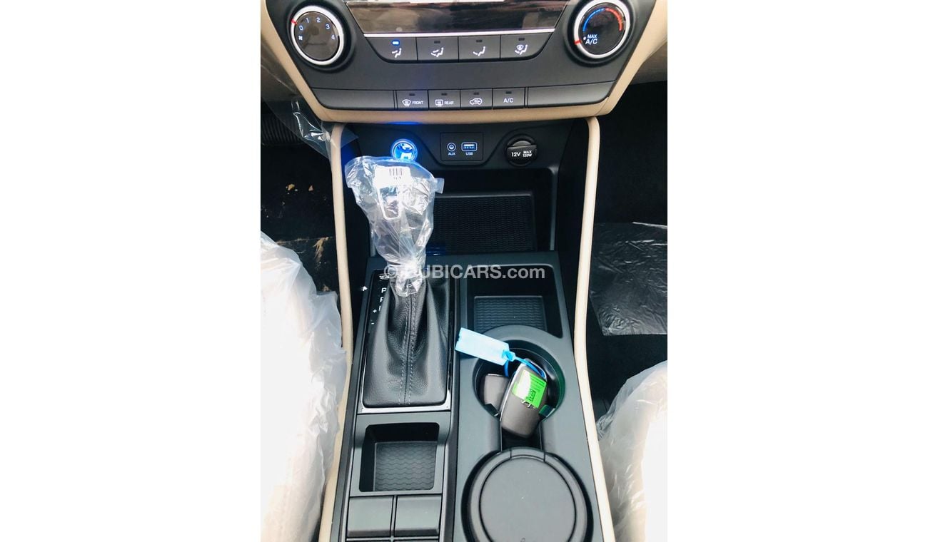 هيونداي توسون 2.0L, POWER SEAT, PUSH/START, ALLOY RIMS 18'', WIRELESS CHARGER, PANRAMC ROOF, GLOVES COOL BOX-HTIF4