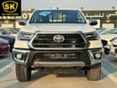 تويوتا هيلوكس SR5 / 2.7L V4 / M/T /  DVD + CAM / 4X4 / WOOD TRIM / FULL OPTION (CODE # 69026)