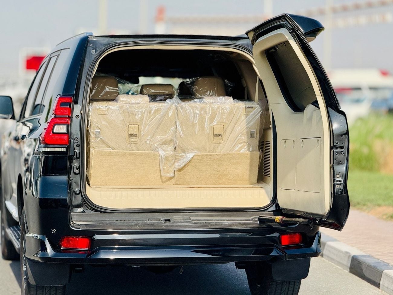 Toyota Prado VXR Toyota Prado Fuel Petrol cylinder 4 black colour outside and beige inside
