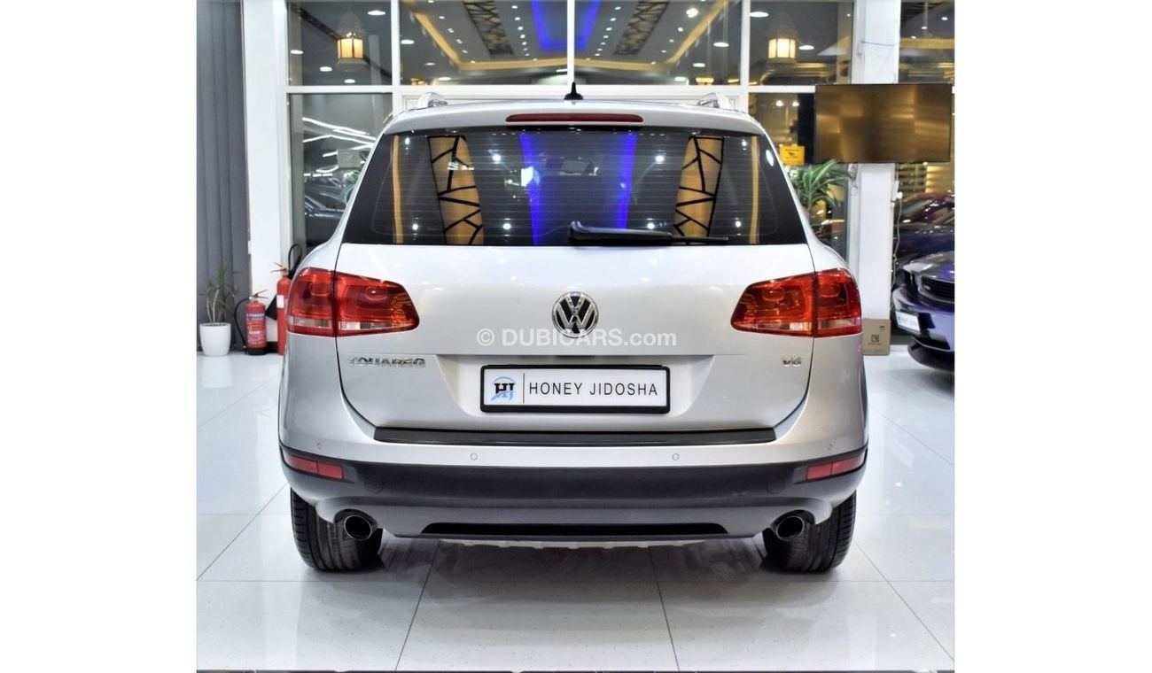 Volkswagen Touareg EXCELLENT DEAL for our Volkswagen Touareg ( 2012 Model ) in Silver Color GCC Specs