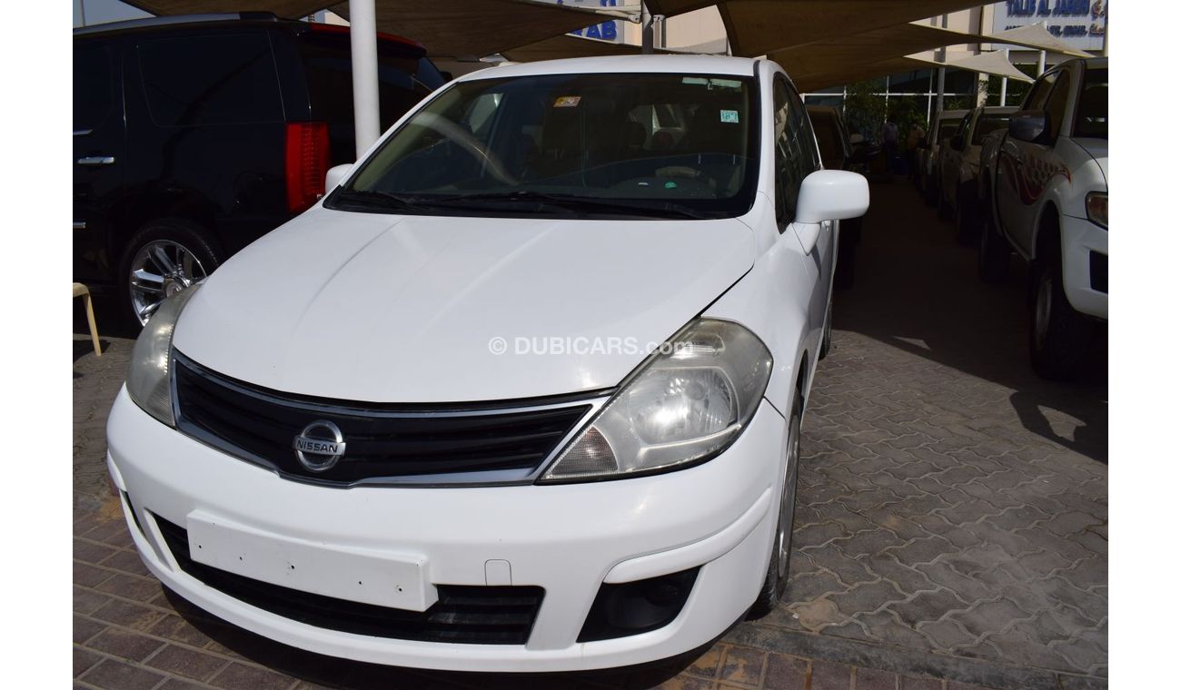 Nissan Tiida Nissan Tida Hatchback,model:2011.Excellent condition