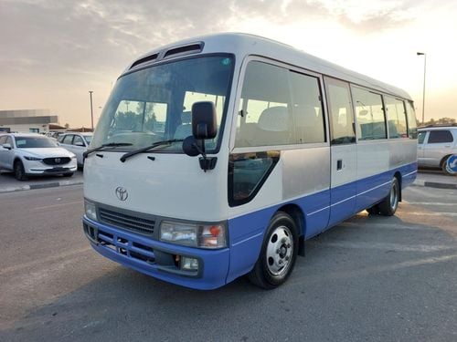 Toyota Coaster 2002 TOYOTA COASTER BUS RHD 4.1 L DIESEL AUTOMATIC (PM11068)