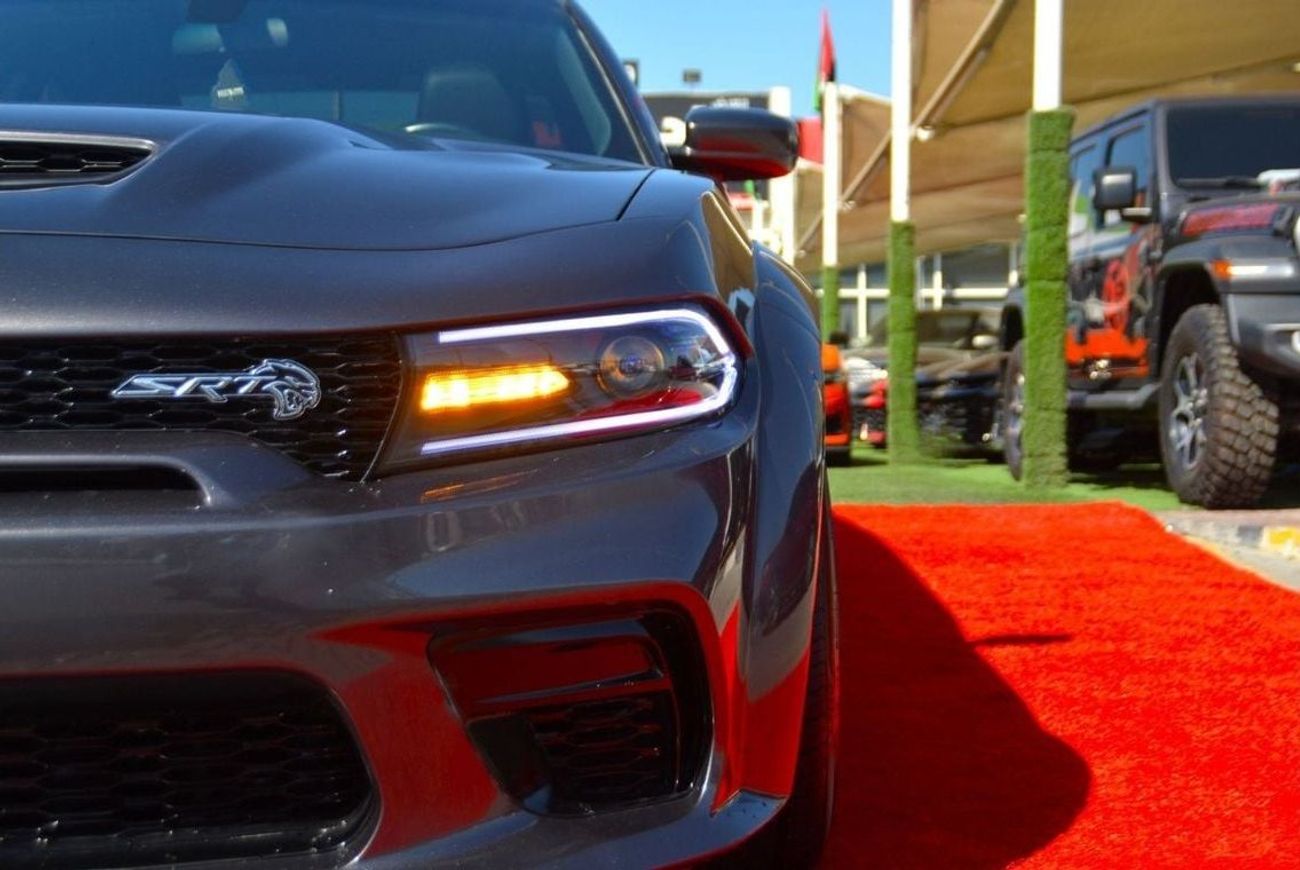 دودج تشارجر SXT Mid 3.6L SRT KIT & WIDR BODE // SUN ROOF //AIR BAGS // VERY GOOD CONDITION