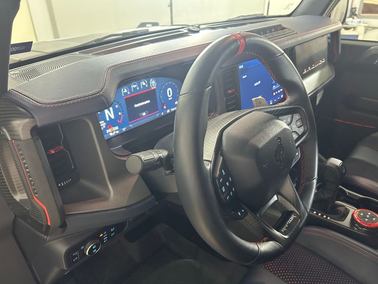 Ford Bronco Raptor B4D4925 BRONCO 4 DOORS RAPTOR 3.0L V6 ECOBOOST W/ ORANGE SBELTS BLACK/BLUE LTHR SSQTCH