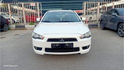 ميتسوبيشي لانسر Mitsubishi Lancer  GLS 2016 Model GCC Specs White Color 4 Cylinder1.6L 96130K.M Original Paint Full