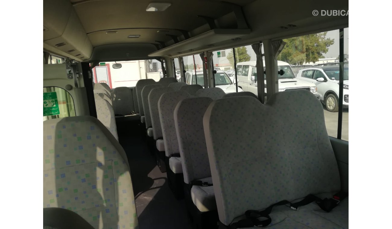 Toyota Coaster 4.0L Diesel Full Option (23 Seats)