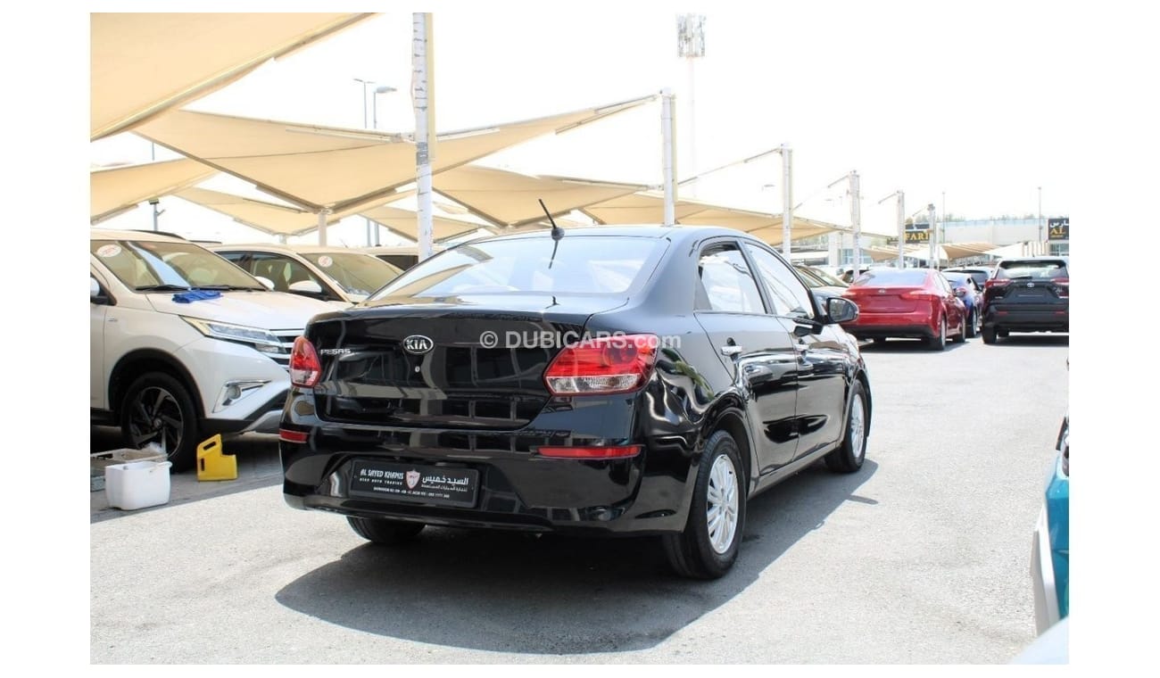 كيا بيجاس MPI توب خالية من الحوادث - خليجي - رقم 1 - الفل - السيارة بحالة الوكالة من الداخل والخارج