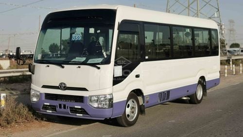 Toyota Coaster 2.7L PETROL, 17.5" TYRE, FABRIC SEATS, XENON HEADLIGHTS (CODE # TC01)
