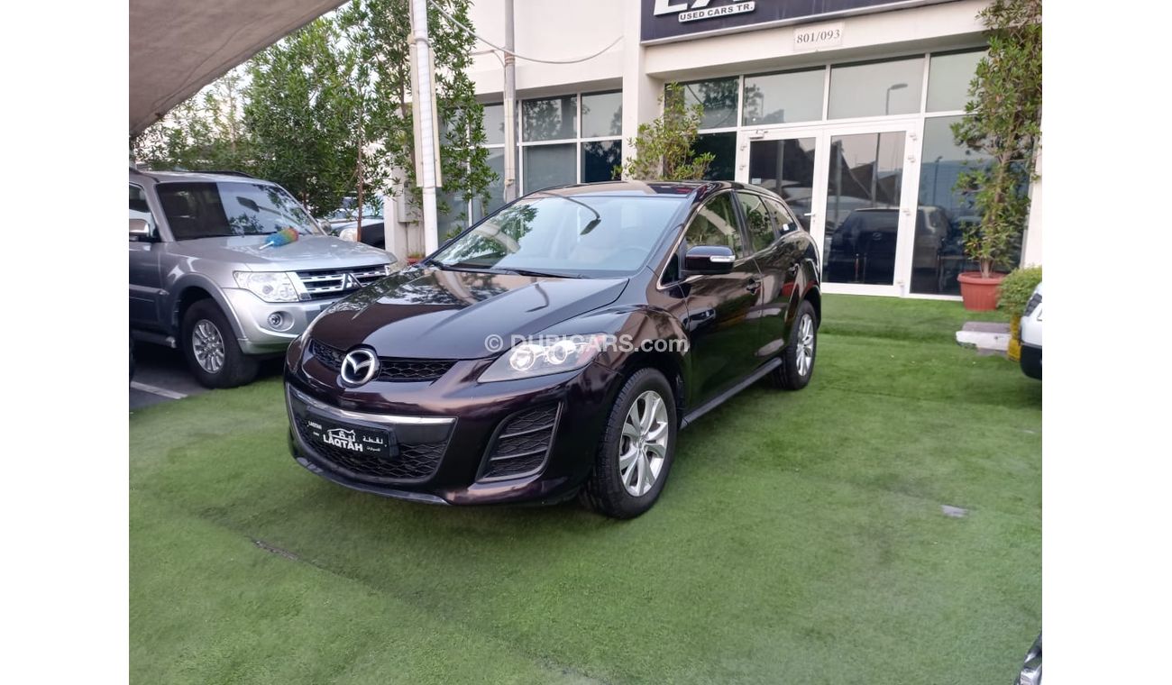 Mazda CX7 Gulf model 2012, cruise control slot, rear spoiler sensor wheels, in excellent condition, you do not