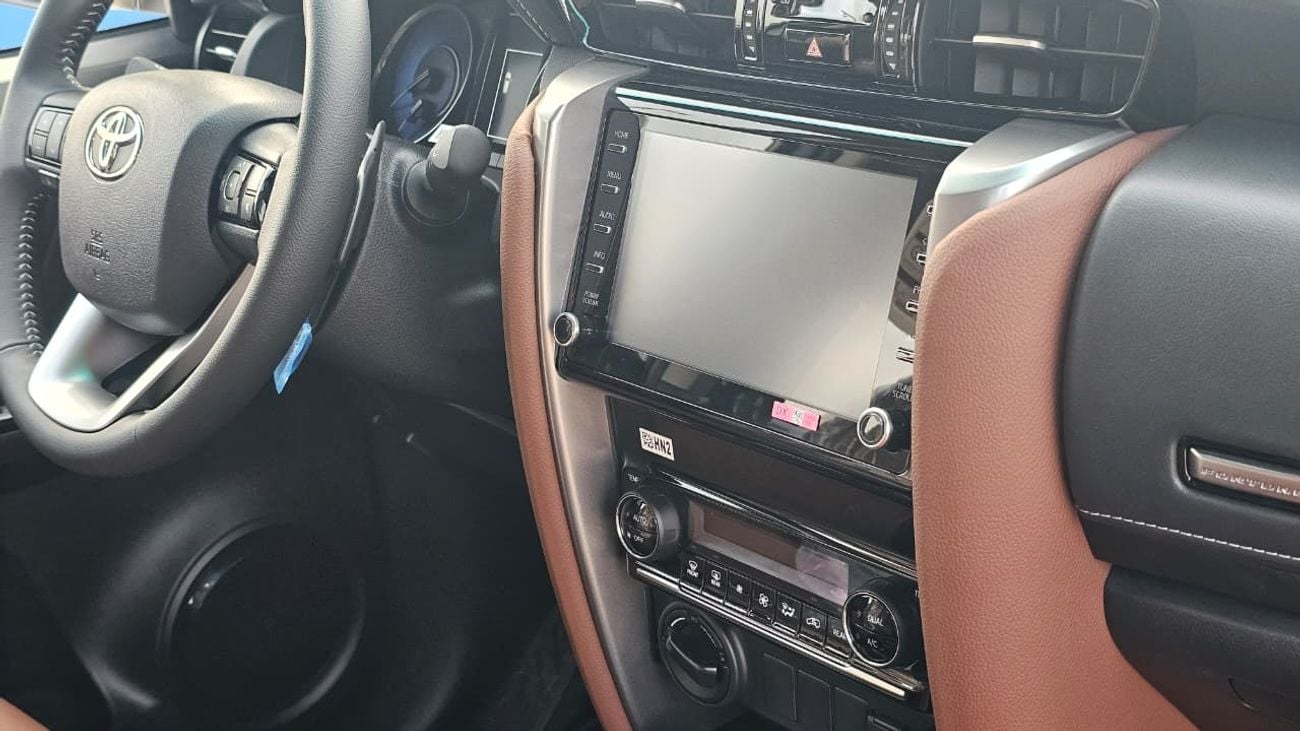 Toyota Fortuner 4.0 GXR V6 2026MODEL WHITE INSIDE BURGUNDY